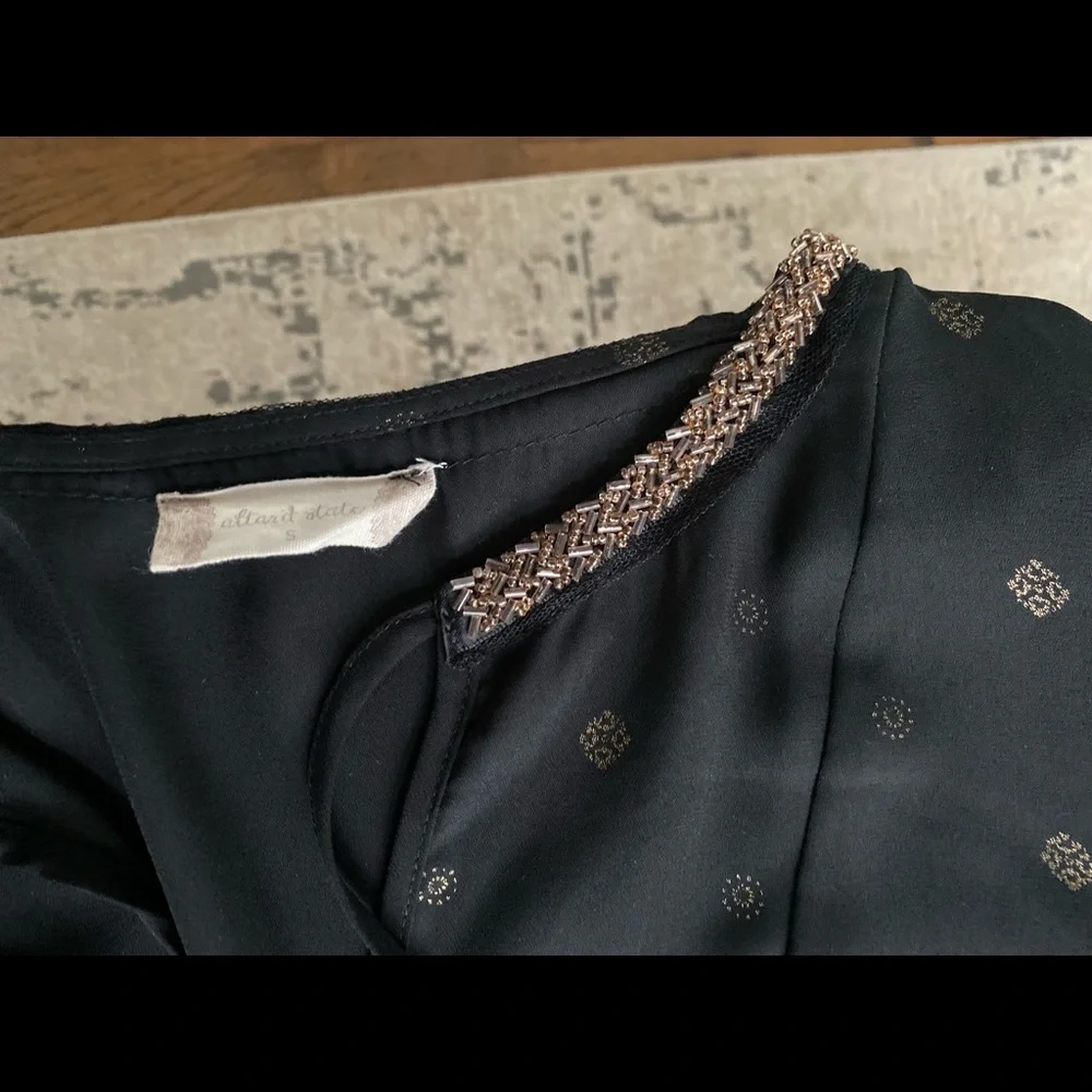 Black peplum top with gold accents - Picture 3 of 5